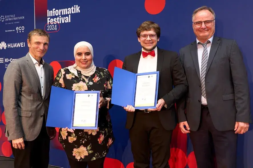 Ronald Bieber (OCG), Mennatallah El-Assady, Dominik Schreiber und Erhard Rahm (GI)